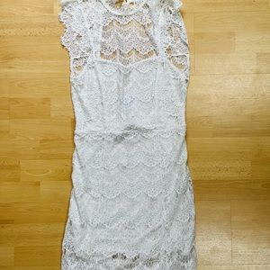 White lace dress. Size M. Free people. NEVER WORN